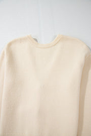 Ivory bouclé knit cardigan with tie-front detail