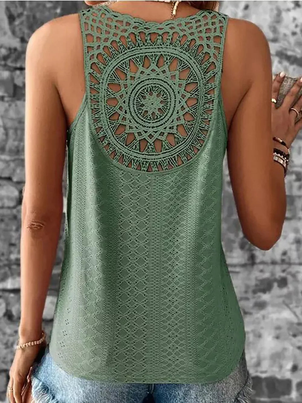 Sage eyelet lace tank top with intricate circular crochet back detail.