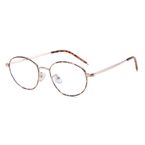 Vintage-inspired round frame eyeglasses with tortoise shell pattern temples and rose gold metal rims.