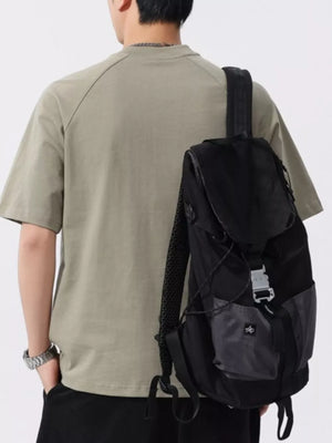 Men's green buttoned henley t-shirt with short sleeves and a crew neck.