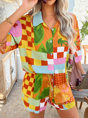 Patchwork print resort shirt and shorts set with colorful blocks and tropical motifs.