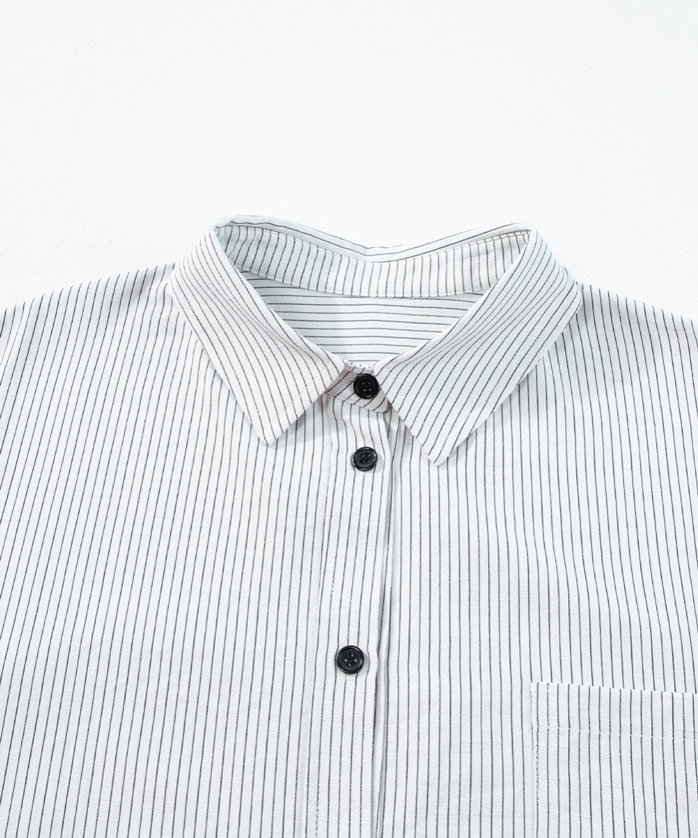 White button-down shirt with black pinstripes and a chest pocket.