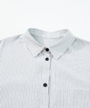White button-down shirt with black pinstripes and a chest pocket.