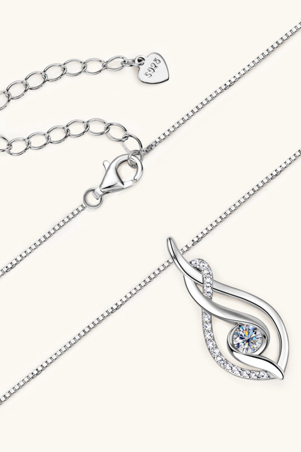 Silver Infinity Moissanite Swirl Pendant Necklace with cubic zirconia accents.
