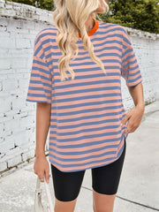 Relaxed fit striped tee with contrast orange neckline and short sleeves.