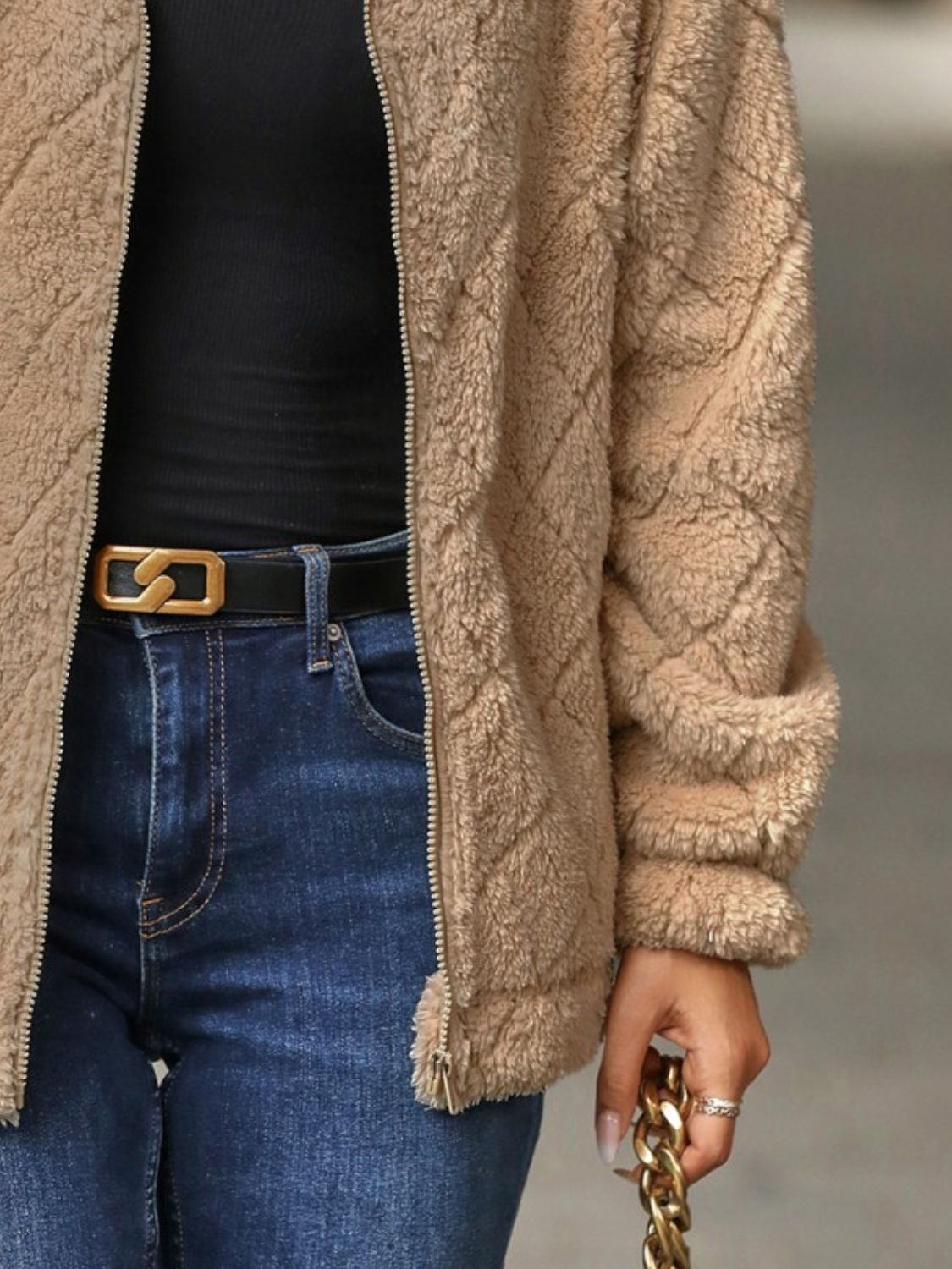 Tan textured teddy zip-up jacket with diamond quilting detail.
