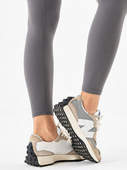 Light gray high-waist leggings with a seamless design.