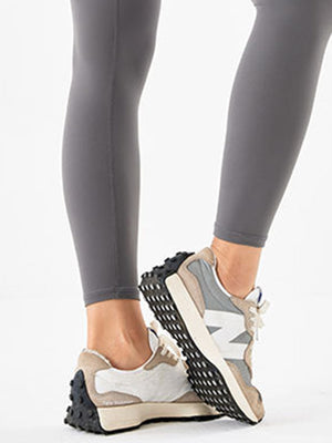 Light gray high-waist leggings with a seamless design.
