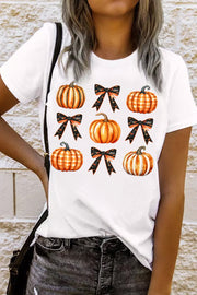 White t-shirt with watercolor pumpkins and black bat pattern bows graphic print.