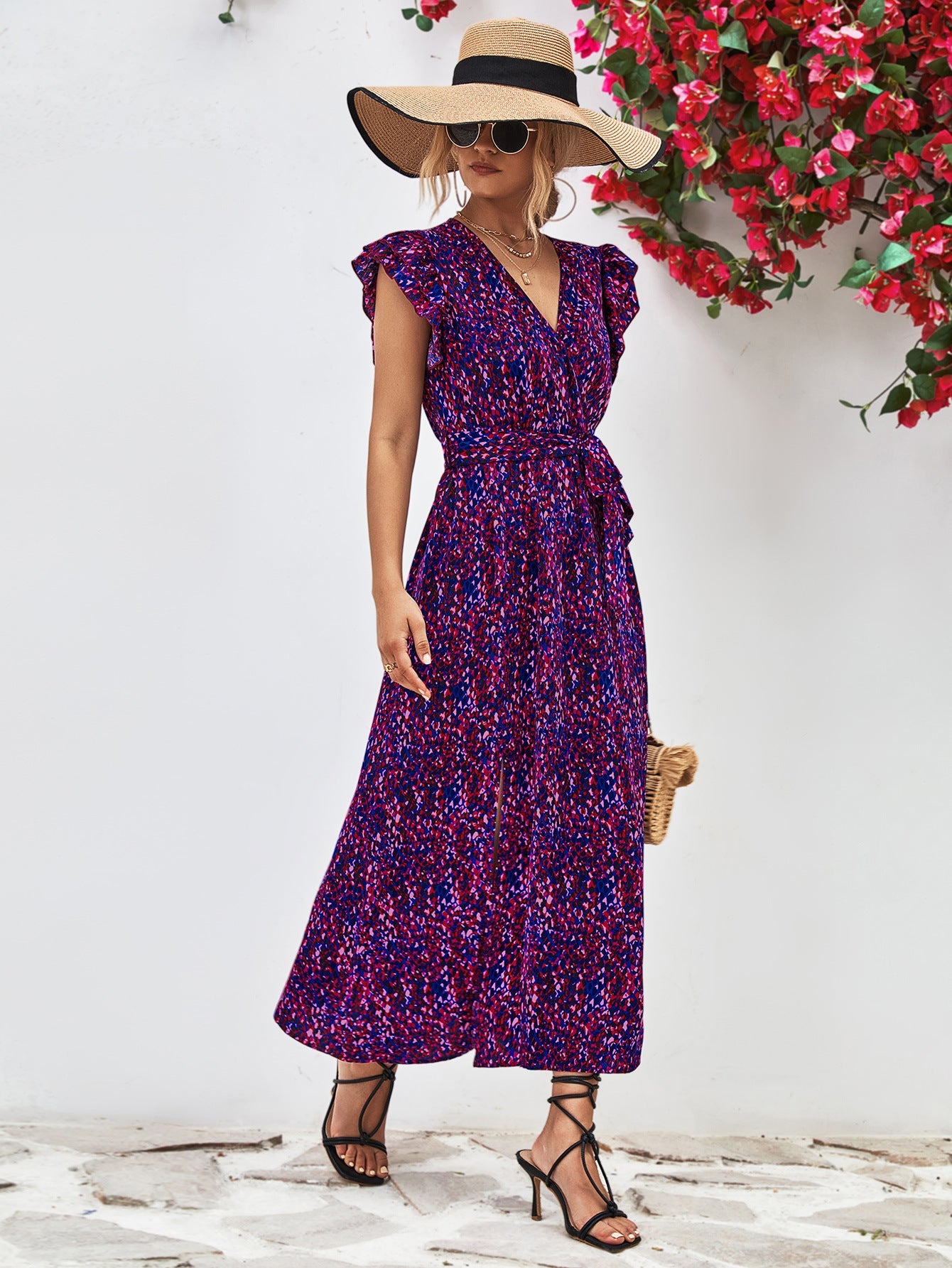 Blue Purple floral wrap midi dress with flutter sleeves and belted waist.