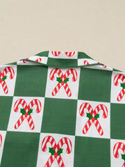 Green pajama set with candy cane checkered print and collar detail.
