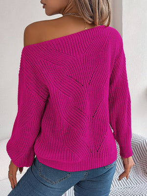 Off-the-shoulder knit sweater in Cerise with openwork detail and long sleeves.