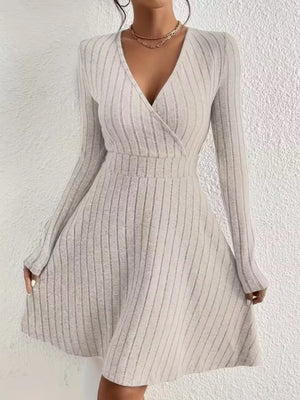 Light Gray ribbed wrap mini dress with a V-neck and long sleeves.