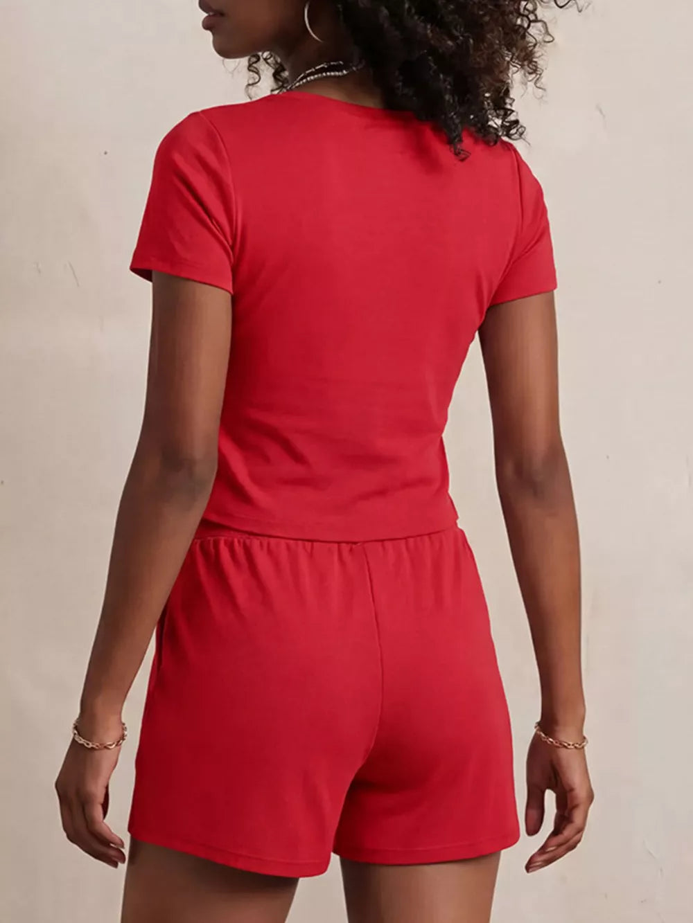 Bright red scoop-neck tee and drawstring shorts set for women, comfortable loungewear.