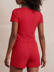 Bright red scoop-neck tee and drawstring shorts set for women, comfortable loungewear.