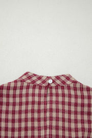 Burgundy plaid long sleeve blouse with button keyhole detail at back neck.