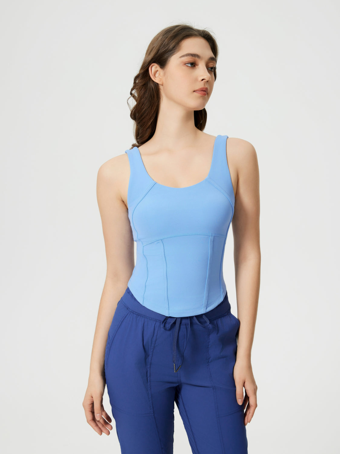 Light blue sculpted seam tank top with built-in support and scoop neckline.