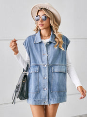 Light blue denim utility vest with button front and four pockets.