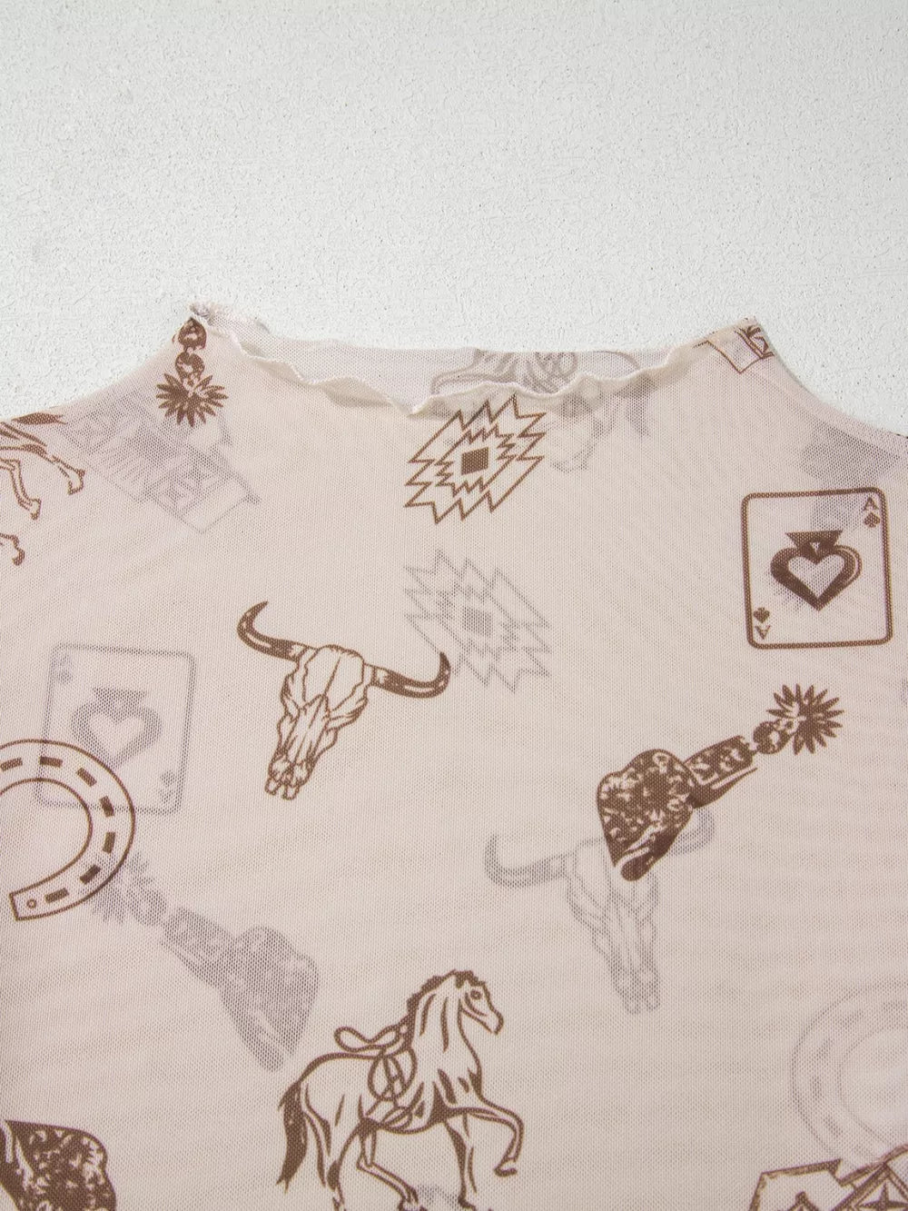 Sheer mesh mock neck shirt with western print, featuring horses, bull skulls, and playing cards.