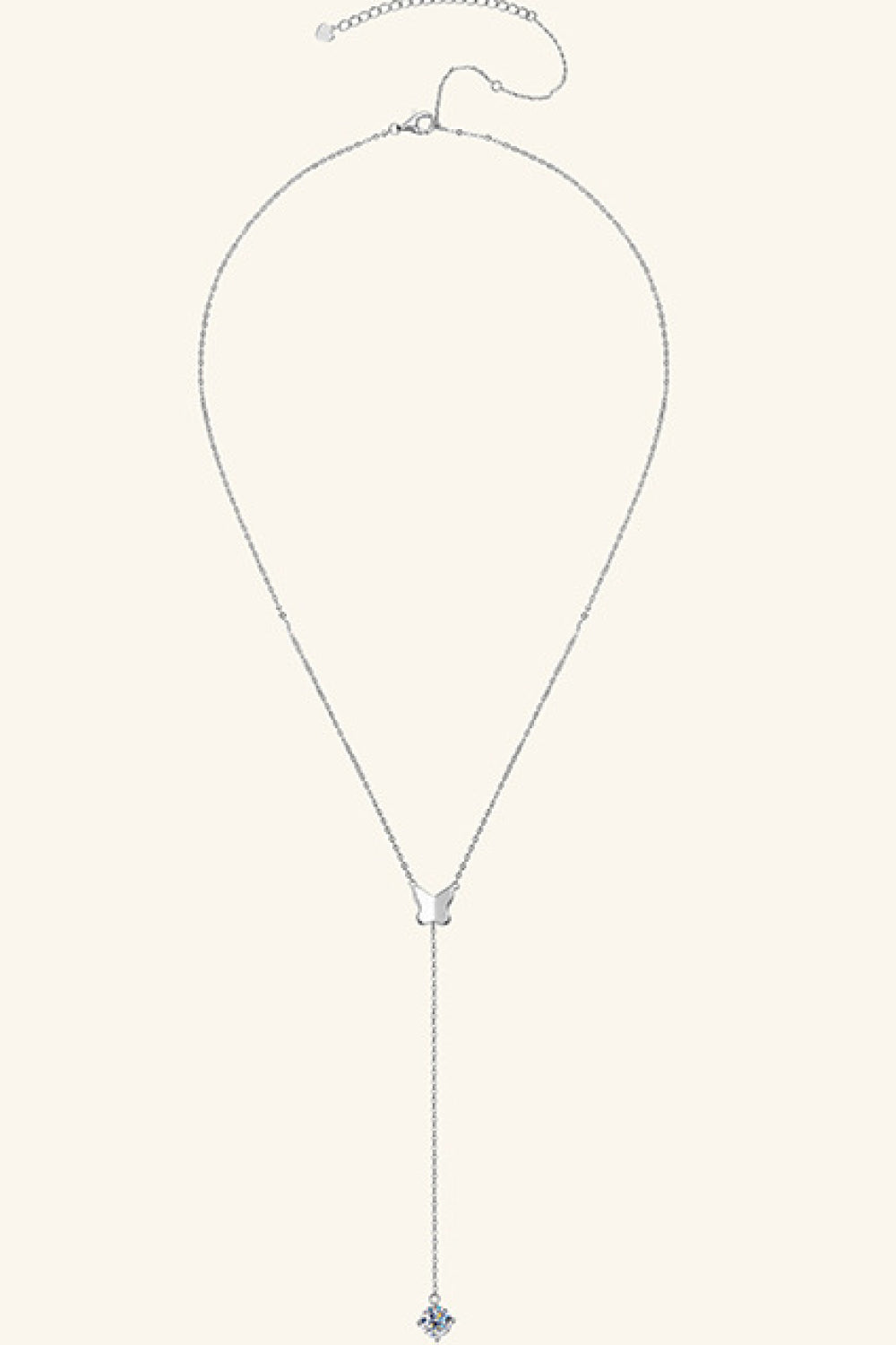 Silver lariat necklace with butterfly pendant and moissanite drop