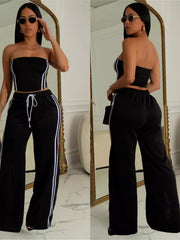 Black tube top outfit set with white side stripes on wide-leg pants and drawstring waist.