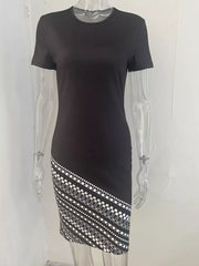 Black bodycon mini dress with geometric print detail on the hem