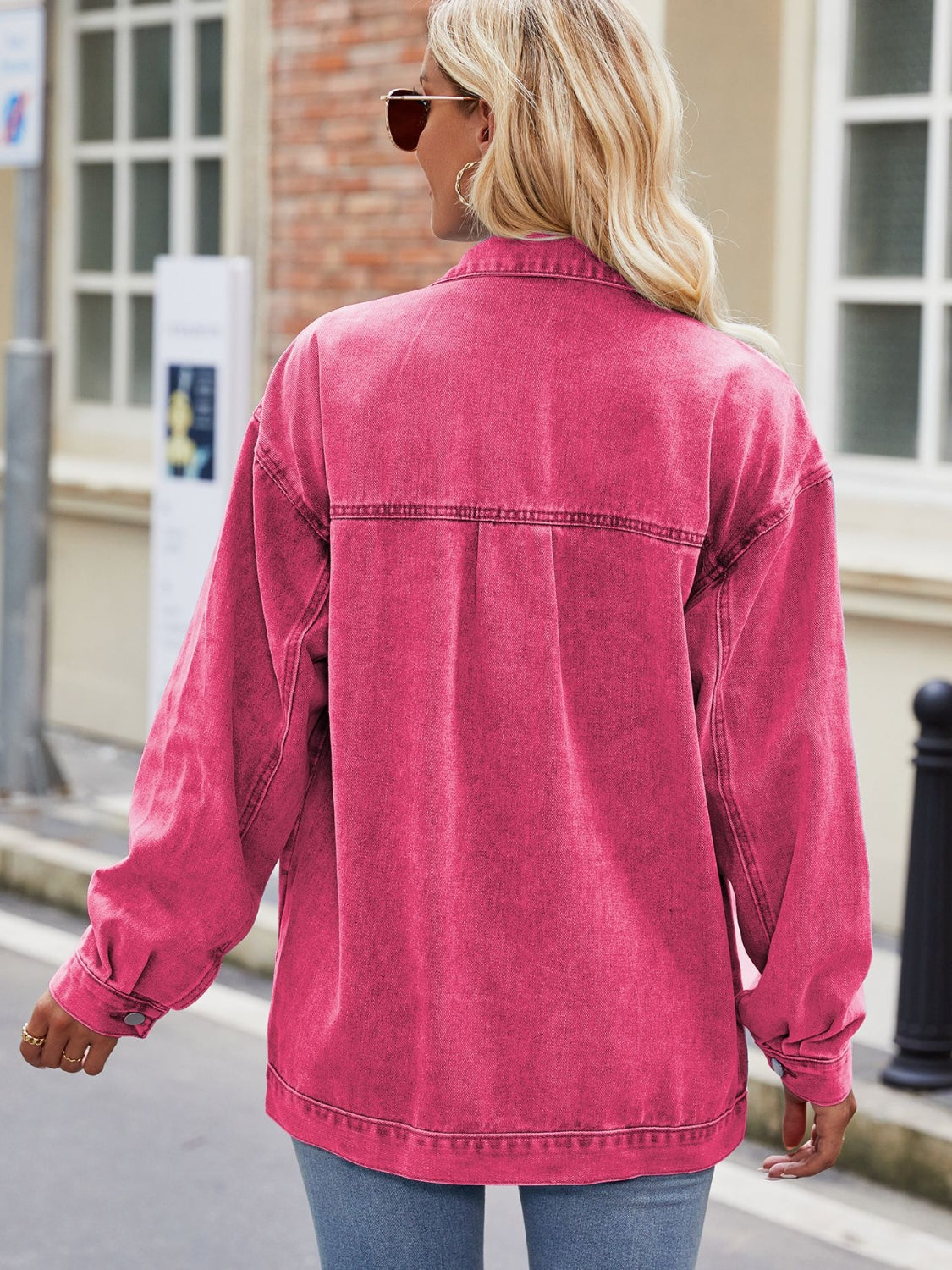 Fuchsia denim oversized shacket with button cuffs and collar detail.
