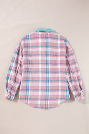 Pastel plaid shacket in dusty pink with a fuzzy blue contrast collar and button cuffs.