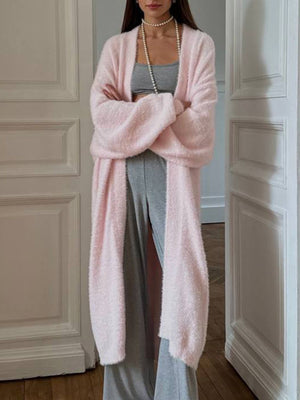 Plush pink acrylic maxi cardigan with balloon sleeves and open front.