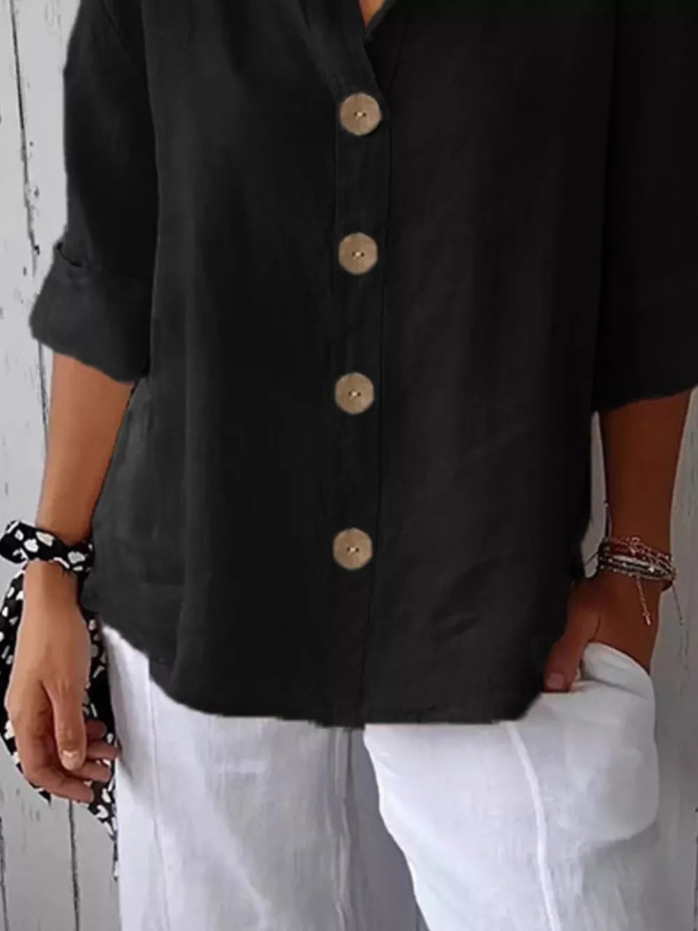Black button-down shirt with relaxed fit and wooden buttons, 3/4 sleeves