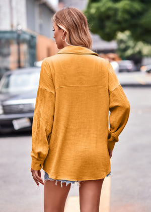 Textured gauze overshirt in tangerine with relaxed silhouette, button cuff and chest pocket detail.