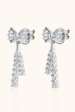 Silver baguette bow drop earrings with cascading crystal accents