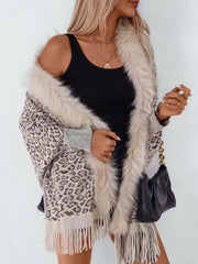 Leopard print cardigan with faux fur trim and fringe hem, in beige and brown tones.