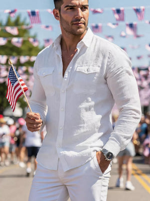 White casual button-up shirt with two chest pockets and buttoned cuffs.