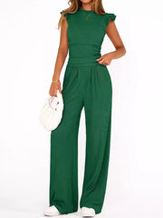 Green ruffled cap sleeve maternity two-piece ensemble with crew neck and wide leg pants.