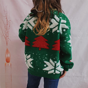 Green acrylic sweater with red Christmas trees and white snowflake appliqués.