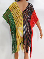 Colorblock crochet cover-up with fringe in green, yellow, black, and red.