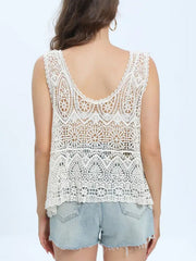 White crochet overlay tank top with intricate lace pattern and scalloped hem.