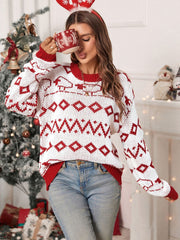 White crewneck sweater with red fair isle pattern and ribbed cuffs and hem.
