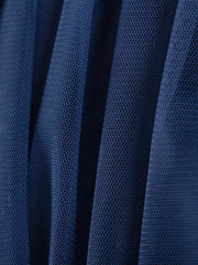 Navy blue tulle fabric with a fine mesh texture, showing soft pleats and folds.