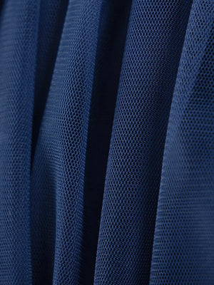 Navy blue tulle fabric with a fine mesh texture, showing soft pleats and folds.