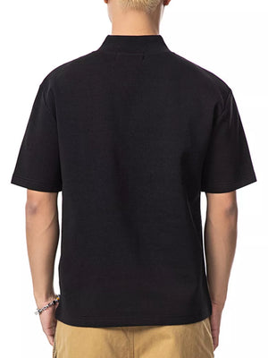 Black cotton mock neck t-shirt with short sleeves, shown from the back.