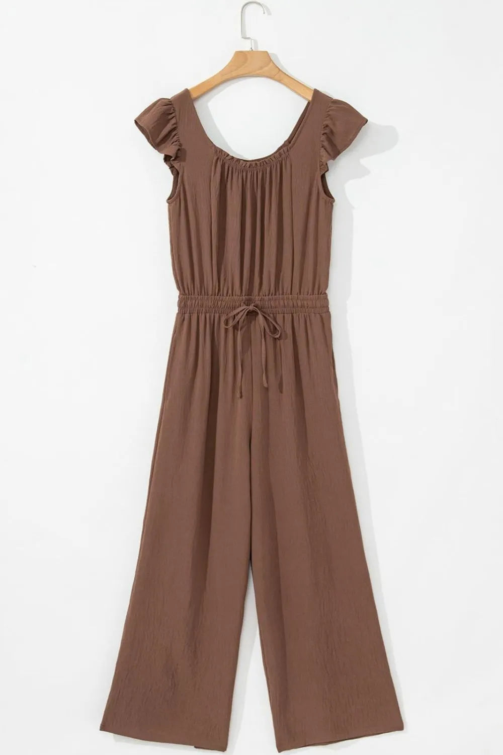 Tan textured drawstring palazzo jumpsuit with ruffle sleeves and wide legs.