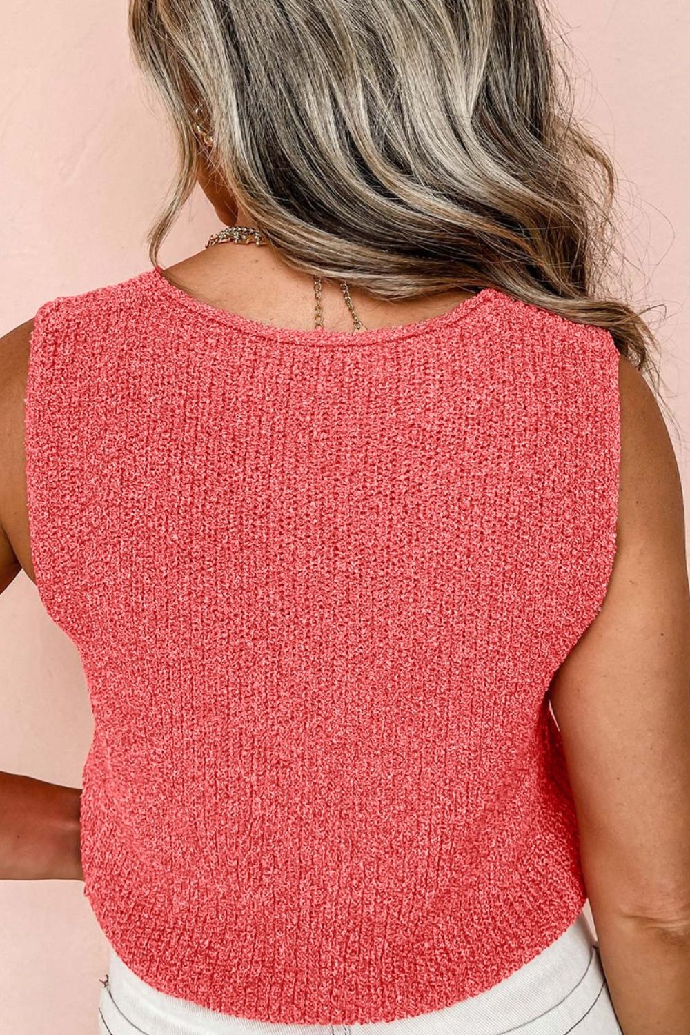 Tie-front knit tank top in burnt coral with textured acrylic fabric and a crew neck.