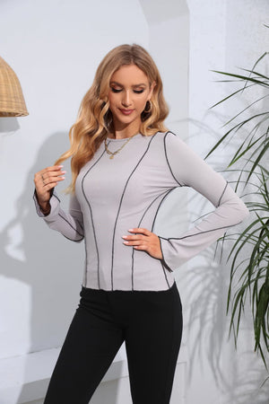 Mid Gray ribbed long sleeve top with contrast stitching detail.