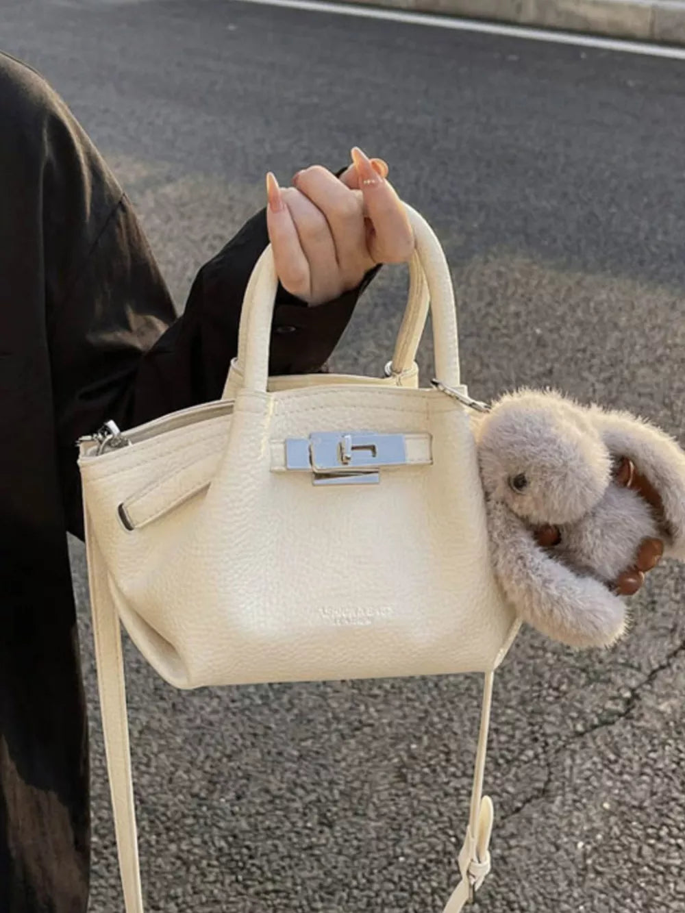 Top Handle Leather Crossbody Bag in Black, close-up detail