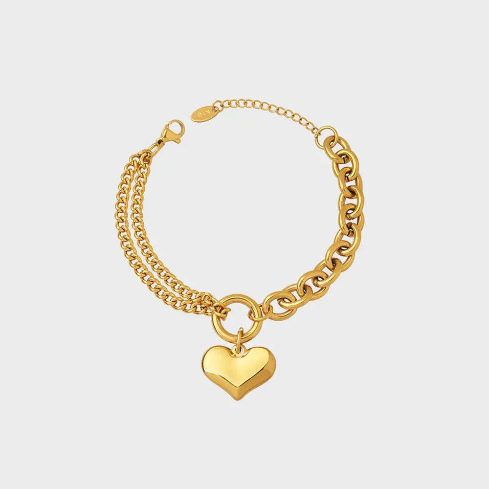 Gold heart charm bracelet with double chain detail