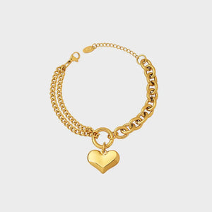 Gold heart charm bracelet with double chain detail