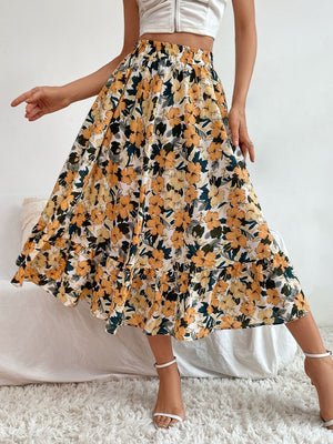 Tiered midi skirt with a yellow floral print and ruffled hem.