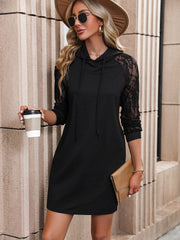 Black lace sleeve hooded mini dress with drawstring neckline.